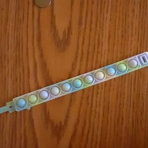 POP IT GLOWING BRACELET NRMINT CONDITION